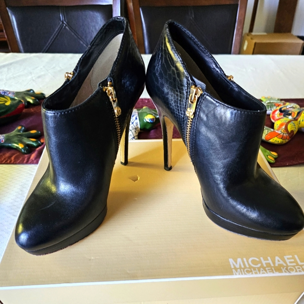 Micheal Kors booties.